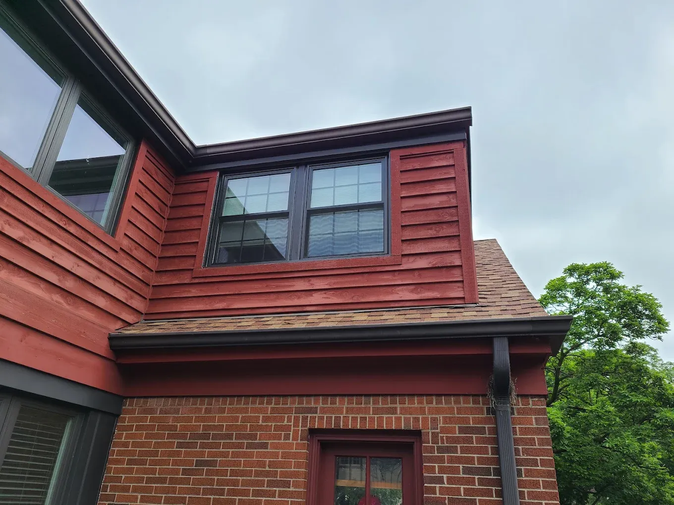 Custom dormer window replacement matched to the upper story of an Elmhurst, Illinois home